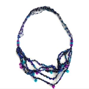 blue yarn and bead necklace